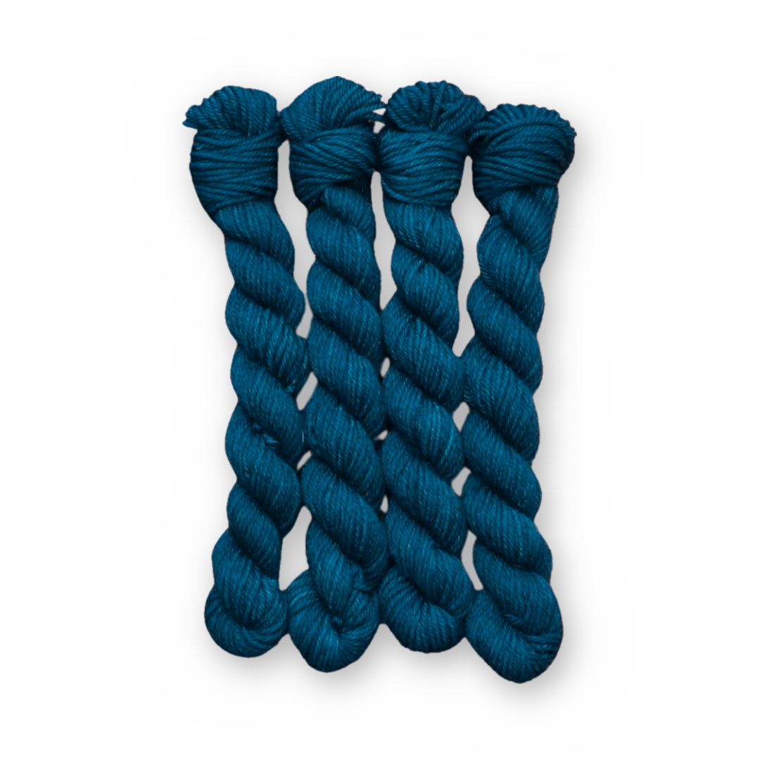 Memoir Color Bar Plush DK weight yarn, 20g mini skein shown for color