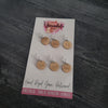 Wooden cast on stitch counters with number clips on a Yarnable card