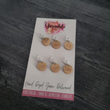 Wooden cast on stitch counters with number clips on a Yarnable card