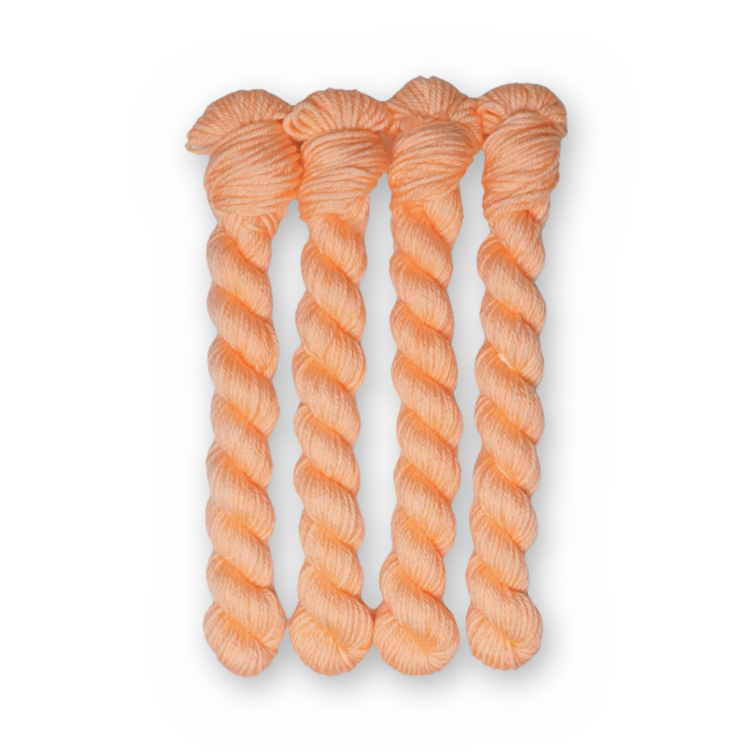 Creamsicle Color Bar Plush DK weight yarn, 20g mini skein shown for color