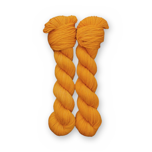Desert Gold Color Bar Plush DK weight yarn, 50g skein shown for color
