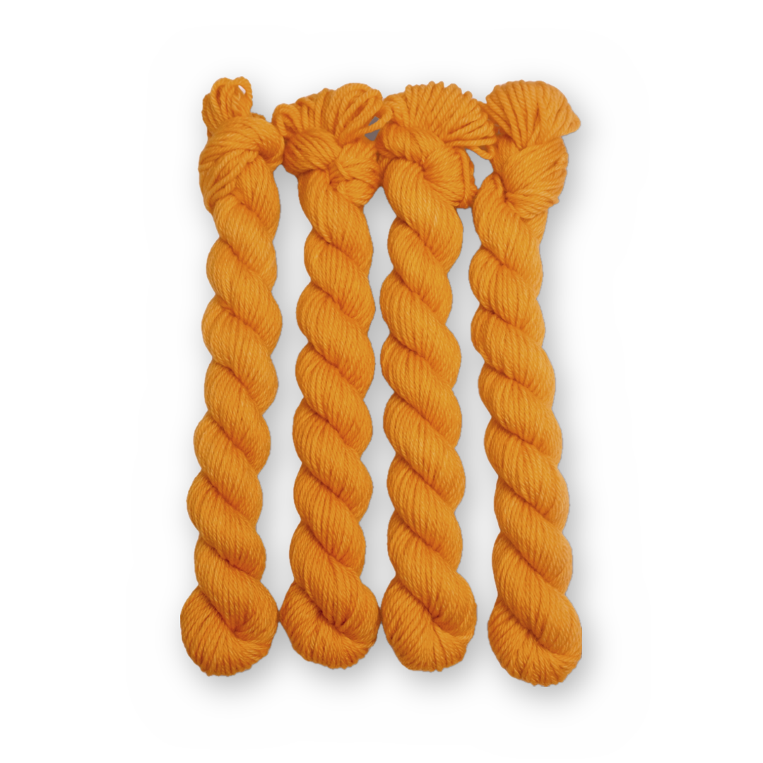 Desert Gold Color Bar Plush DK weight yarn, 20g mini skein shown for color