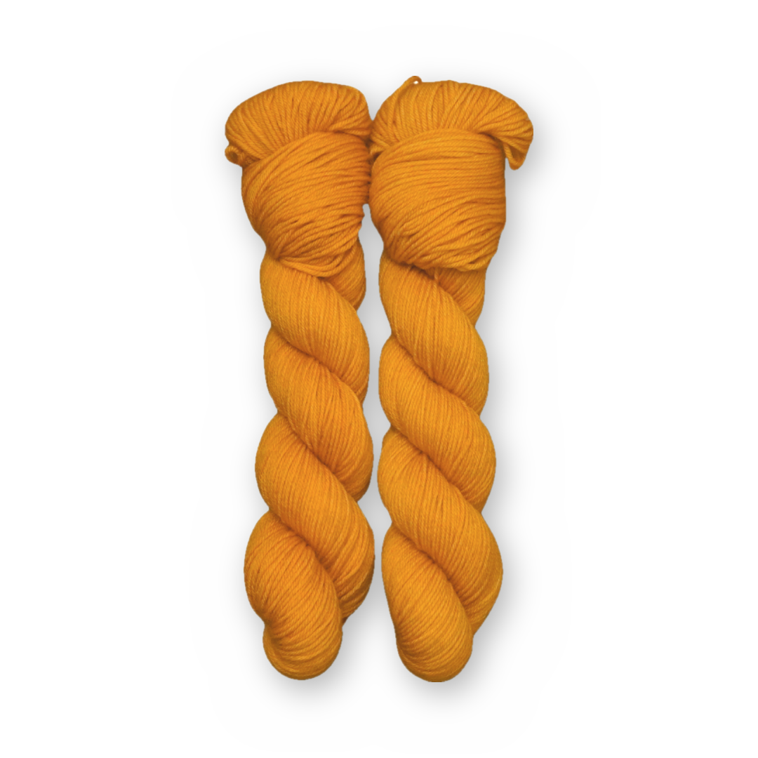 Desert Gold Color Bar Plush Sock fingering weight yarn, 50g skein shown for color