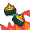 Two cartoon-style trash cans on fire with flames and smoke on a white background
