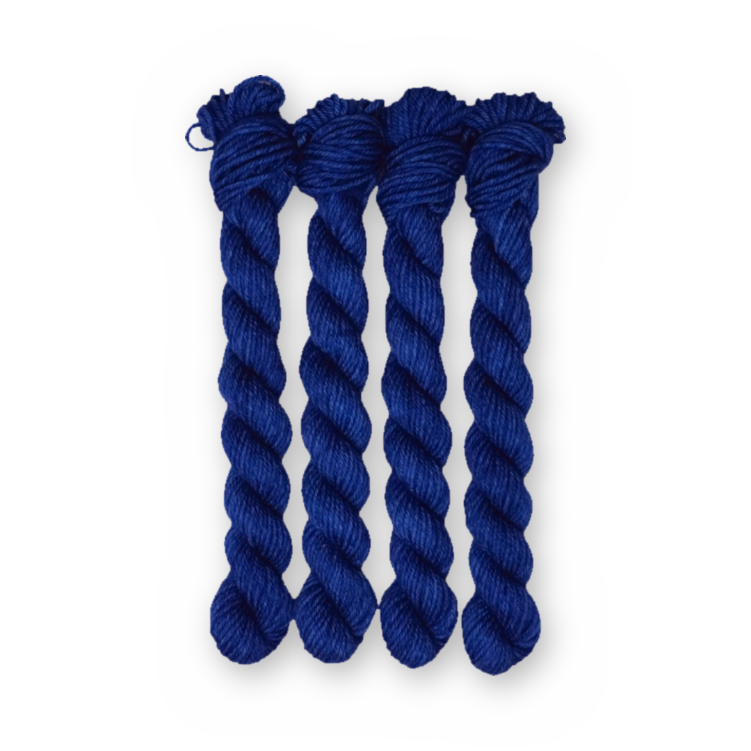 Huckleberry Color Bar Plush DK weight yarn, 20g mini skein shown for color