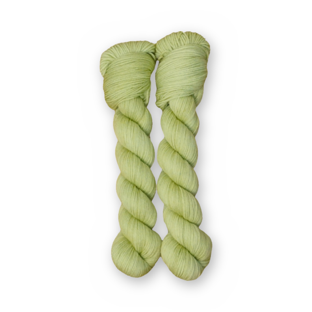 Pistachio Color Bar Plush Sock fingering weight yarn, 50g skein shown for color
