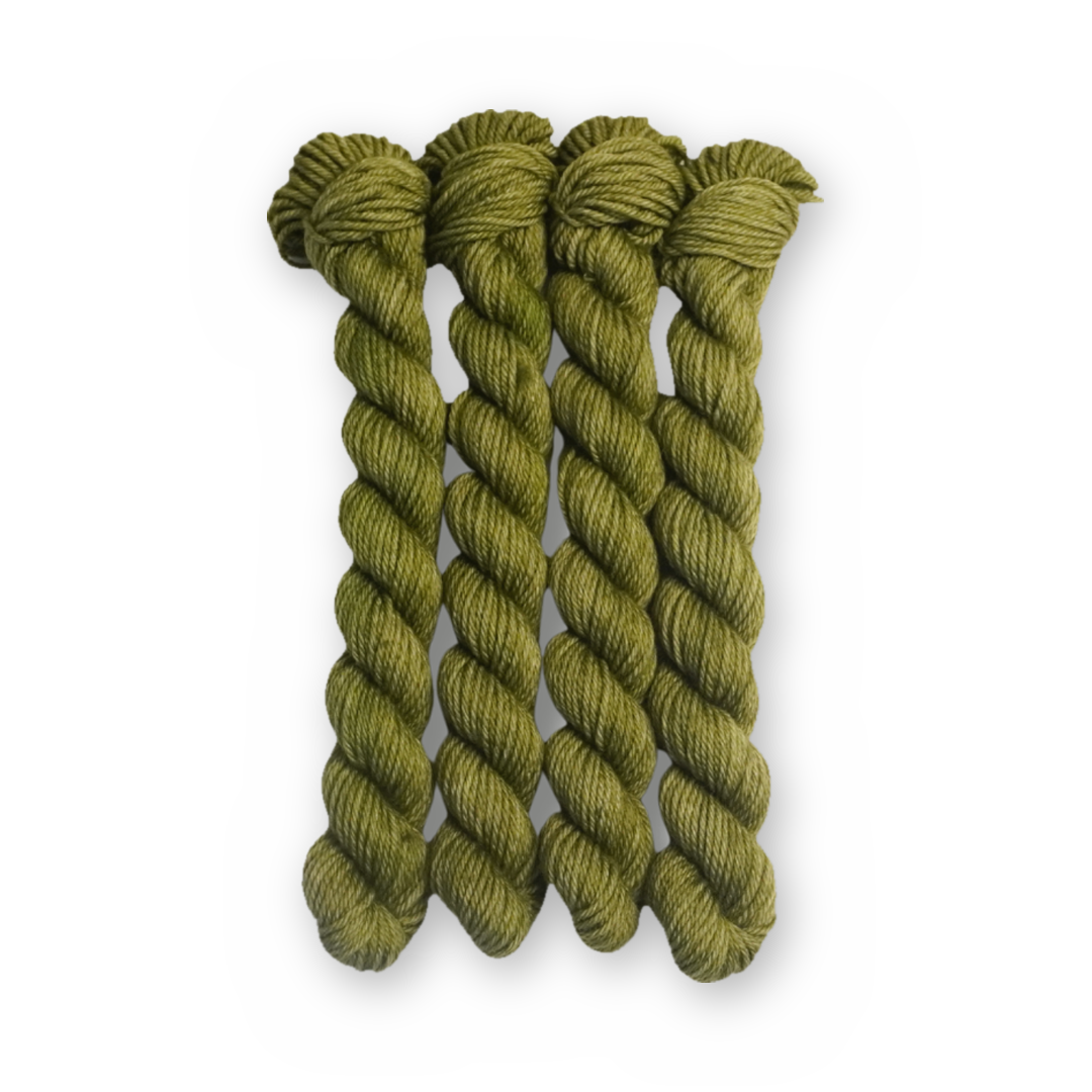 Spruce the Juice Color Bar Plush DK weight yarn, 20g mini skein shown for color