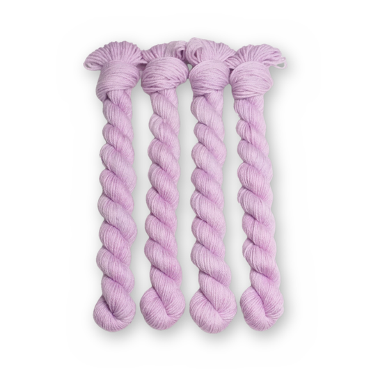 Thistledown Color Bar Plush Sock fingering weight yarn, 20g mini skein shown for color