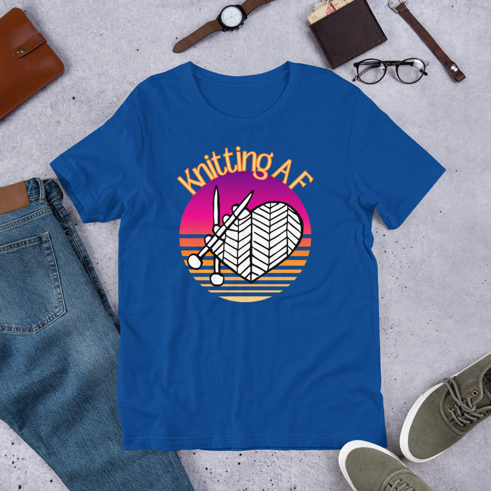 True royal scoop neck tee with the Knitting AF design in magenta and orange sunset stripes with knitting needles